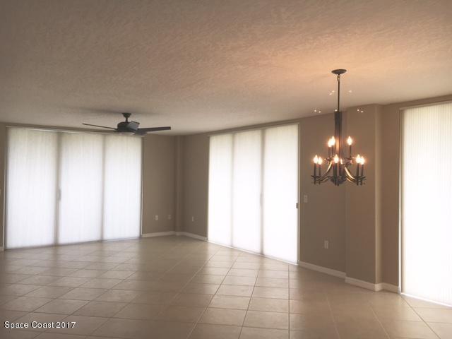 811 Del Rio Way, Unit 402 Merritt Island, FL 32953 - Photo 7 of 14 GREAT ROOM BLINDS CLOSED