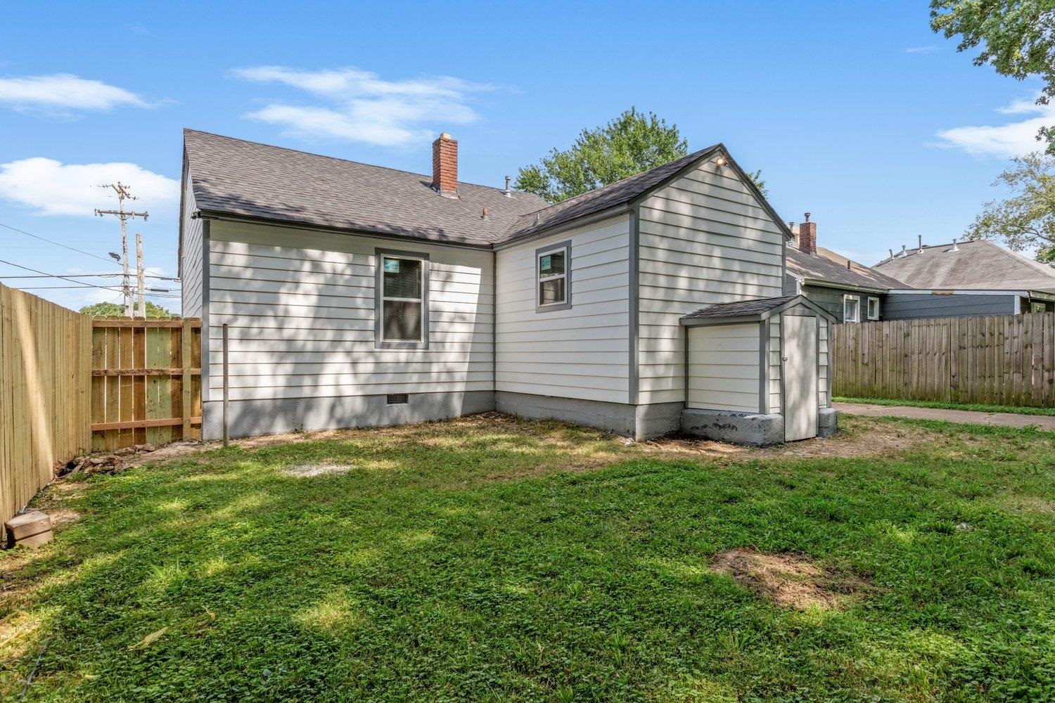 41 North Bingham Street Memphis, TN 38112 - Photo 7 of 9 a front view of a house with a garden