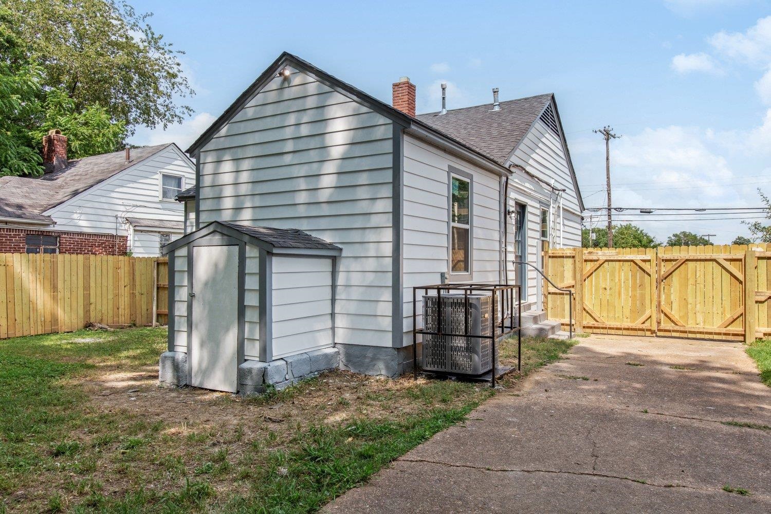 41 North Bingham Street Memphis, TN 38112 - Photo 8 of 9 a view of a house with wooden fence