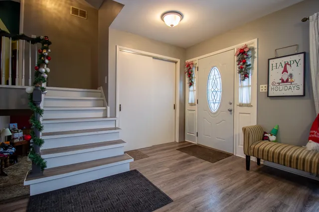 a view of a living room and dining room