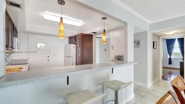 $266,000 | 427 Golden Isles Drive, Unit 5J, Hallandale Beach, FL 33009