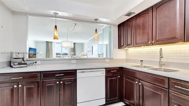 $266,000 | 427 Golden Isles Drive, Unit 5J, Hallandale Beach, FL 33009