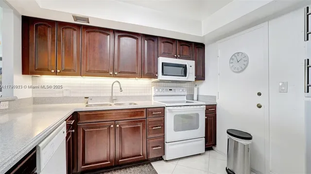 $266,000 | 427 Golden Isles Drive, Unit 5J, Hallandale Beach, FL 33009
