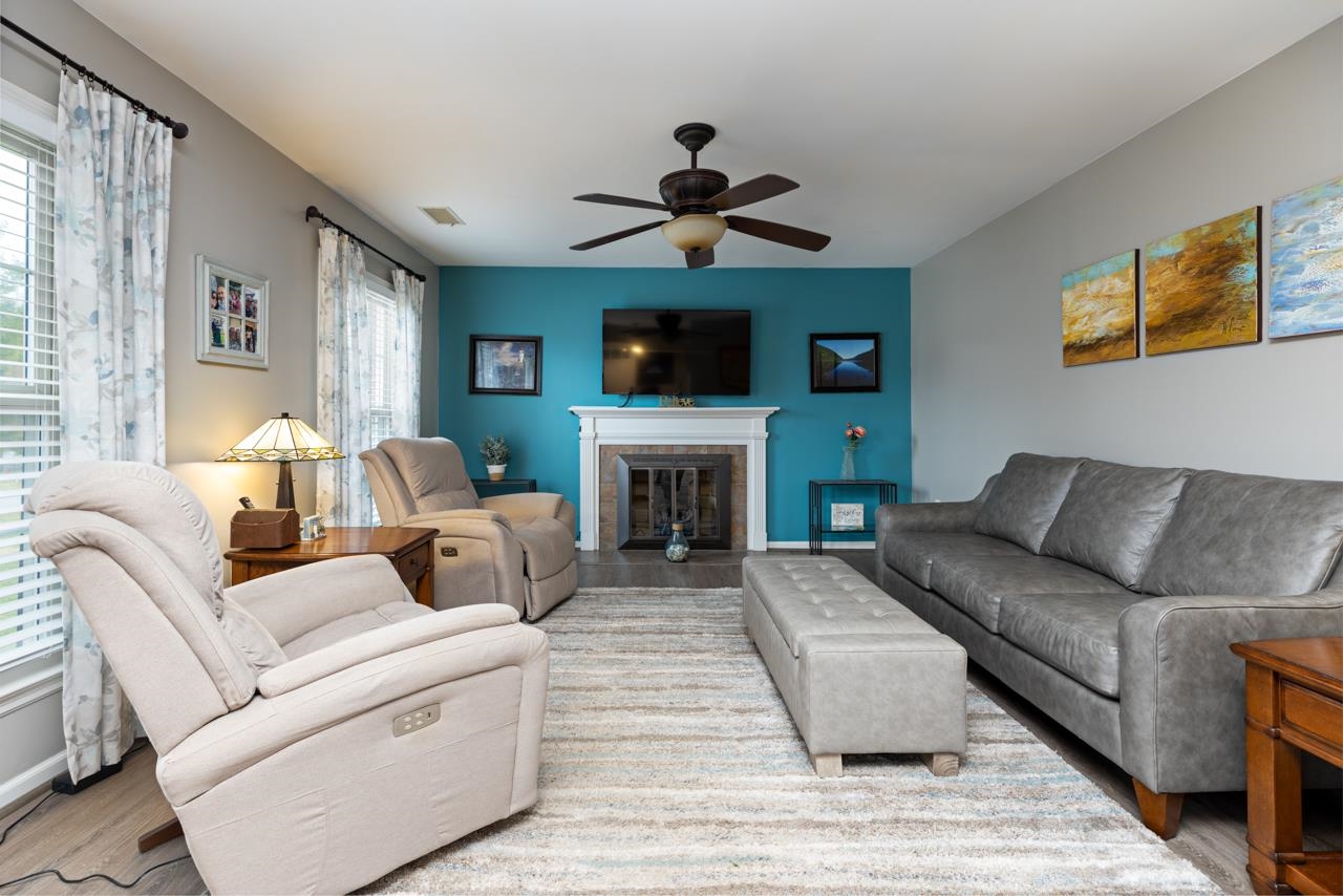 204 Robinhood Road Staunton, VA 24401 - Photo 2 of 46 a living room with furniture a flat screen tv and a fireplace