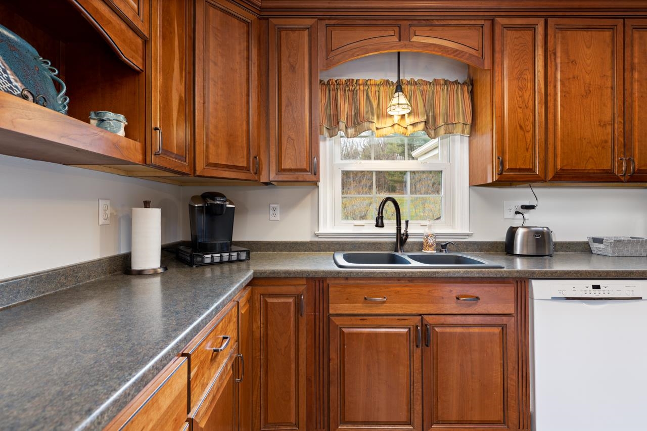 204 Robinhood Road Staunton, VA 24401 - Photo 9 of 46 a kitchen with stainless steel appliances granite countertop a sink a stove and cabinets