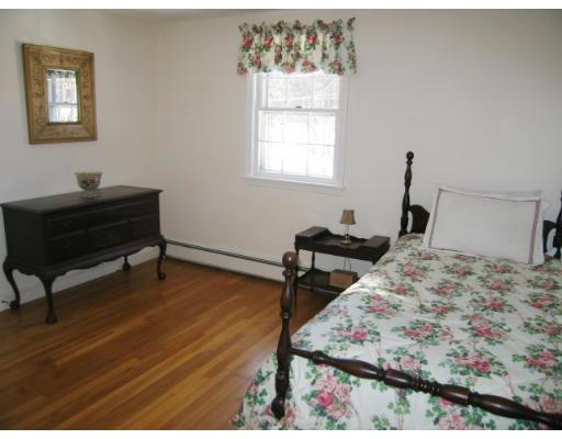 505 Hayward Mill Road Concord, MA 01742 - Photo 12 of 12 a bedroom with bed and a window