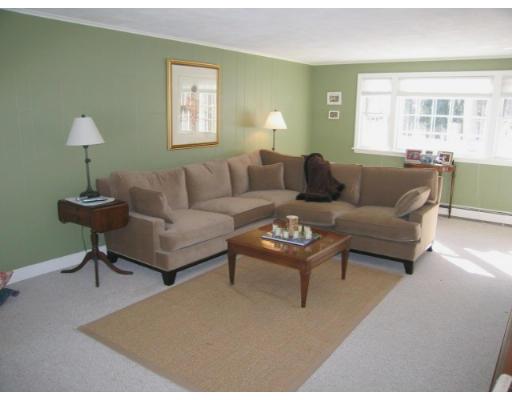 505 Hayward Mill Road Concord, MA 01742 - Photo 2 of 12 a living room with furniture lamp and a window