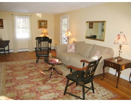 505 Hayward Mill Road Concord, MA 01742 - Photo 6 of 12 a living room with furniture and wooden floor