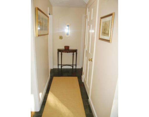 505 Hayward Mill Road Concord, MA 01742 - Photo 10 of 12 a view of a hallway with wooden floor