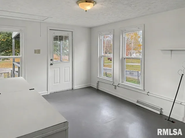 an empty room with windows