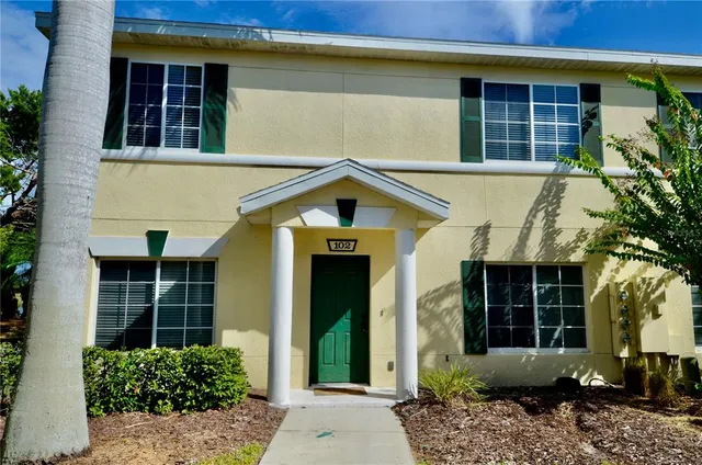 a front view of a house having yard