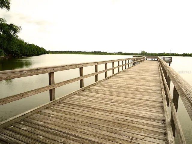 a view of wooden floor with a lake