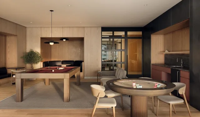 a room that has a table and chairs in it