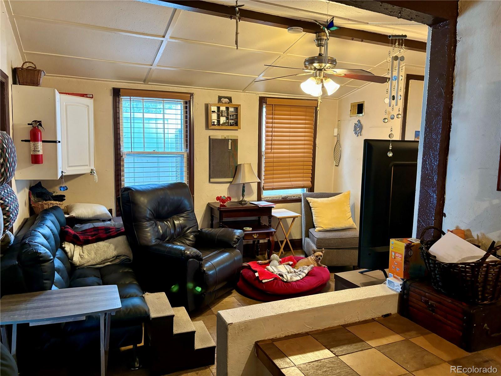 2568 Eaton Street Edgewater, CO 80214 - Photo 6 of 11 a living room with furniture and a window