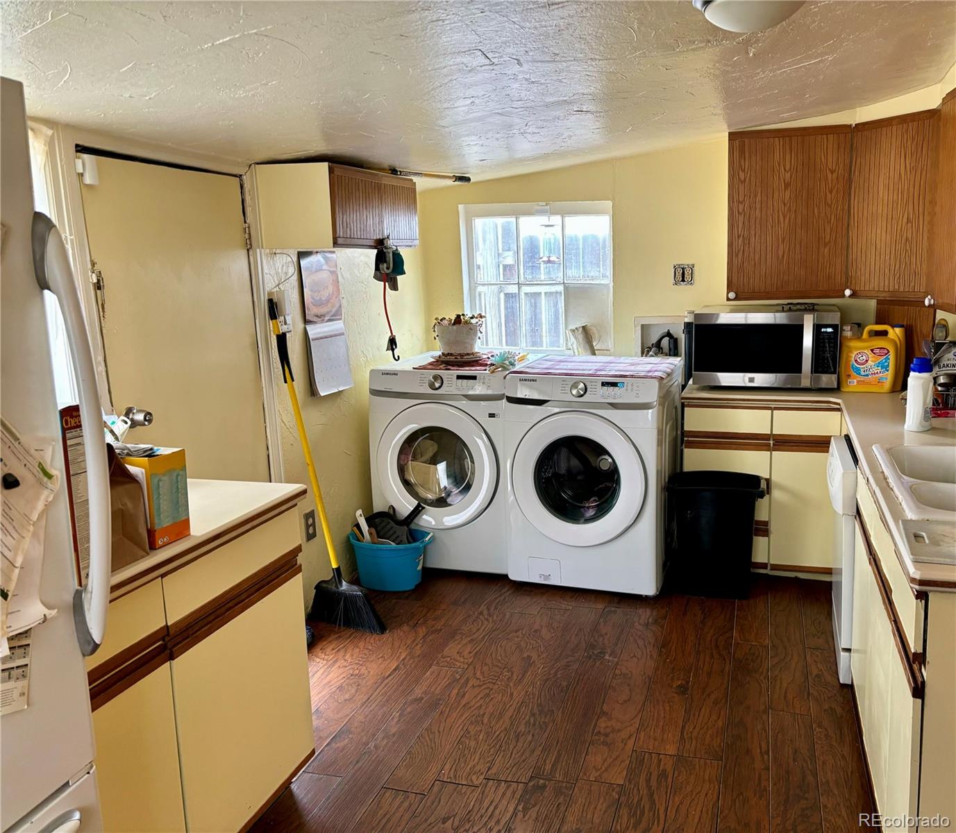 2568 Eaton Street Edgewater, CO 80214 - Photo 8 of 11 a utility room with dryer and washer