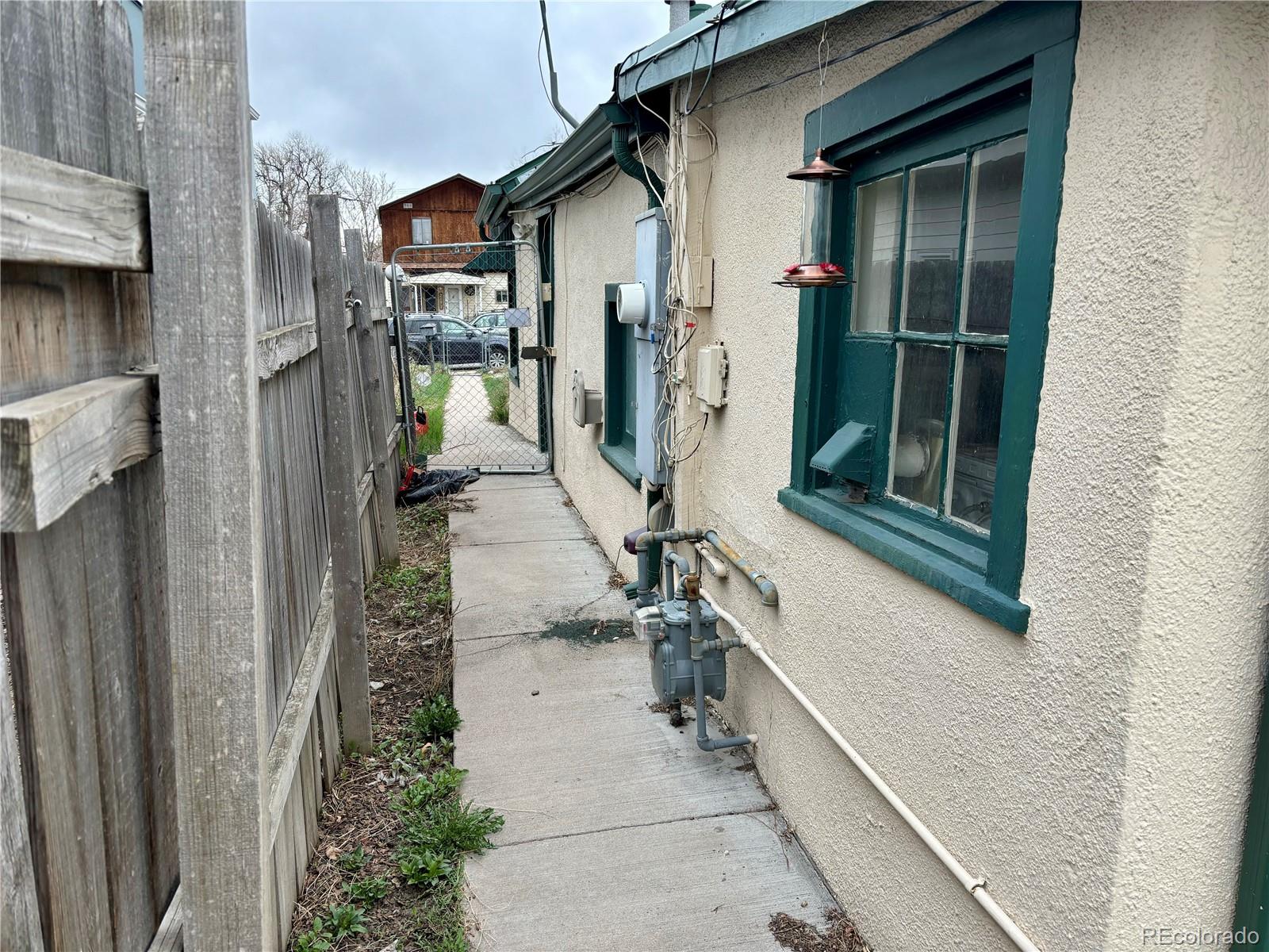 2568 Eaton Street Edgewater, CO 80214 - Photo 9 of 11 a view of a house with backyard and sitting area