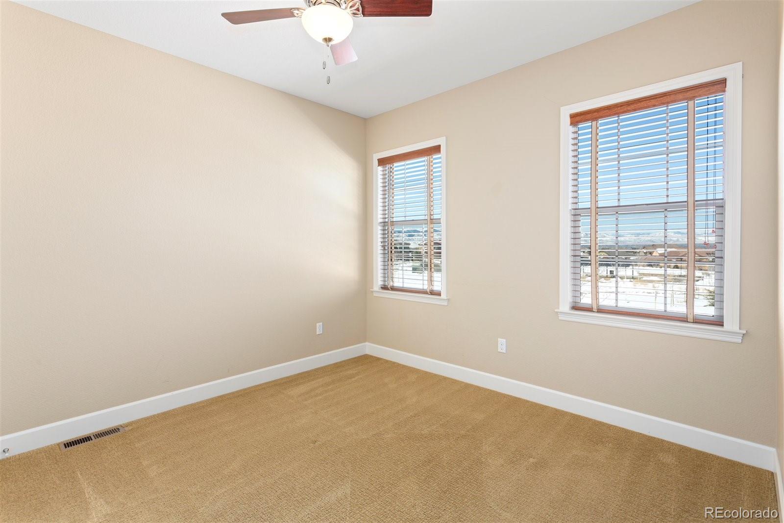 10634 Sundial Rim Road Highlands Ranch, CO 80126 - Photo 29 of 40 an empty room with a window