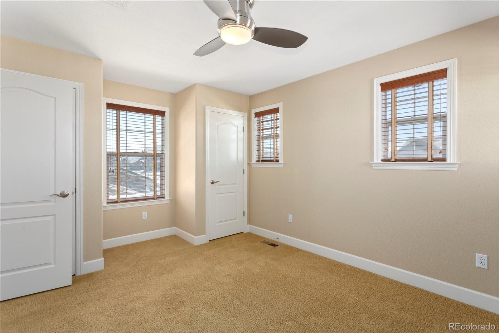 10634 Sundial Rim Road Highlands Ranch, CO 80126 - Photo 30 of 40 a view of an empty room with a window