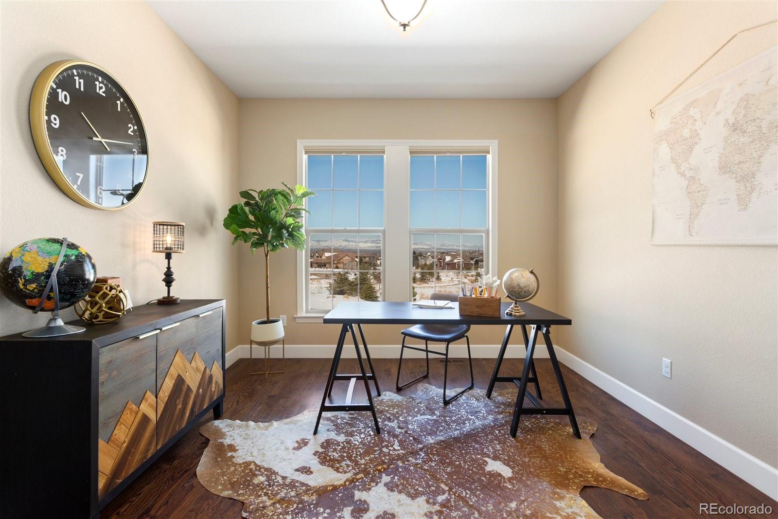 10634 Sundial Rim Road Highlands Ranch, CO 80126 - Photo 9 of 40 a workspace with furniture and window