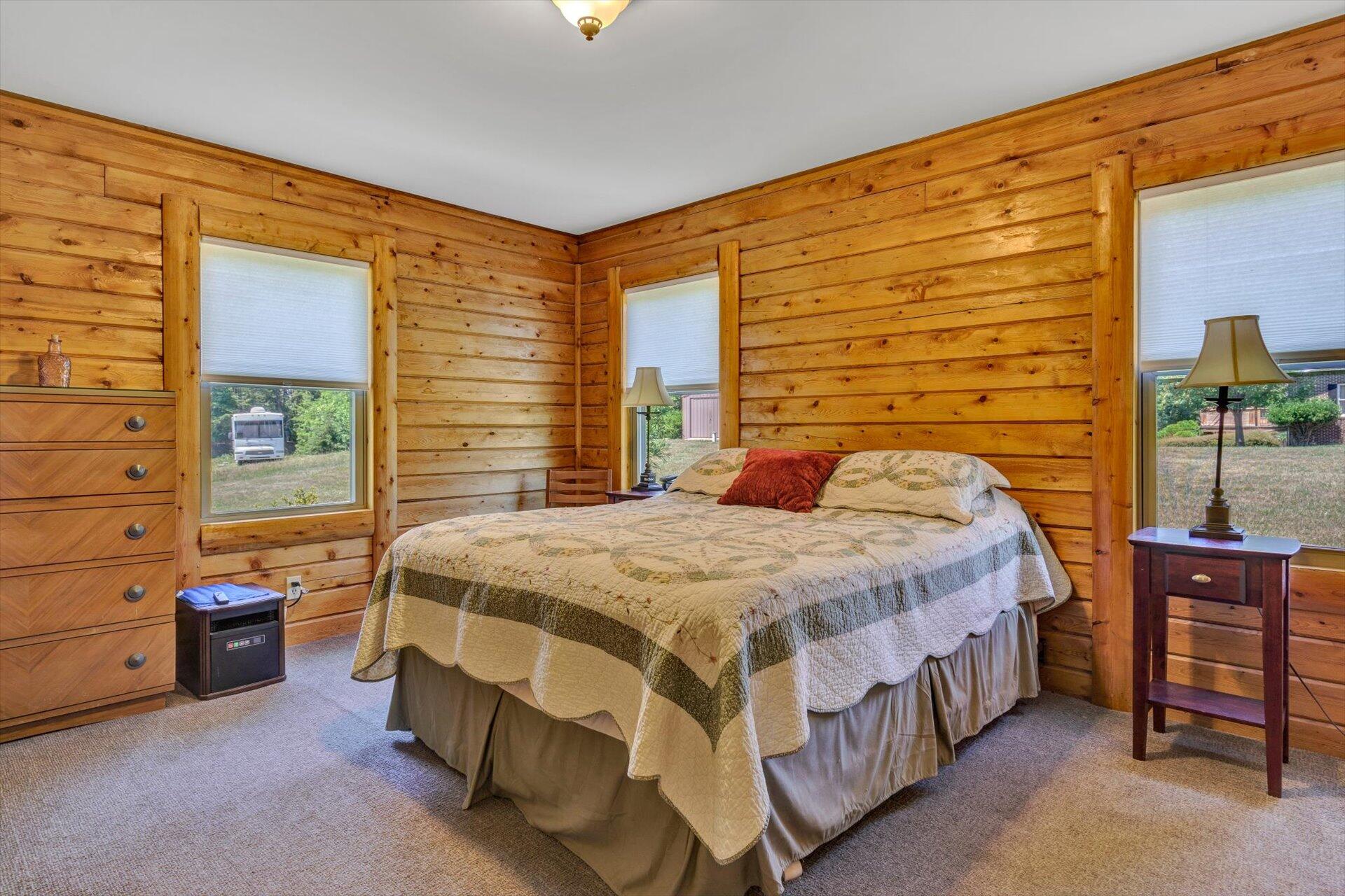 3499 Kemp Ford Road Union Hall, VA 24176 - Photo 14 of 52 a bedroom with a bed and a dresser