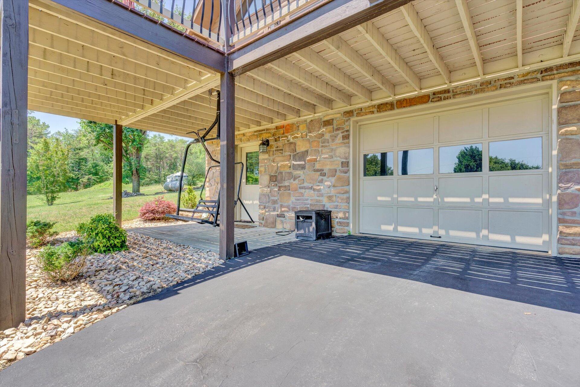 3499 Kemp Ford Road Union Hall, VA 24176 - Photo 34 of 52 a view of a backyard with a garden and deck
