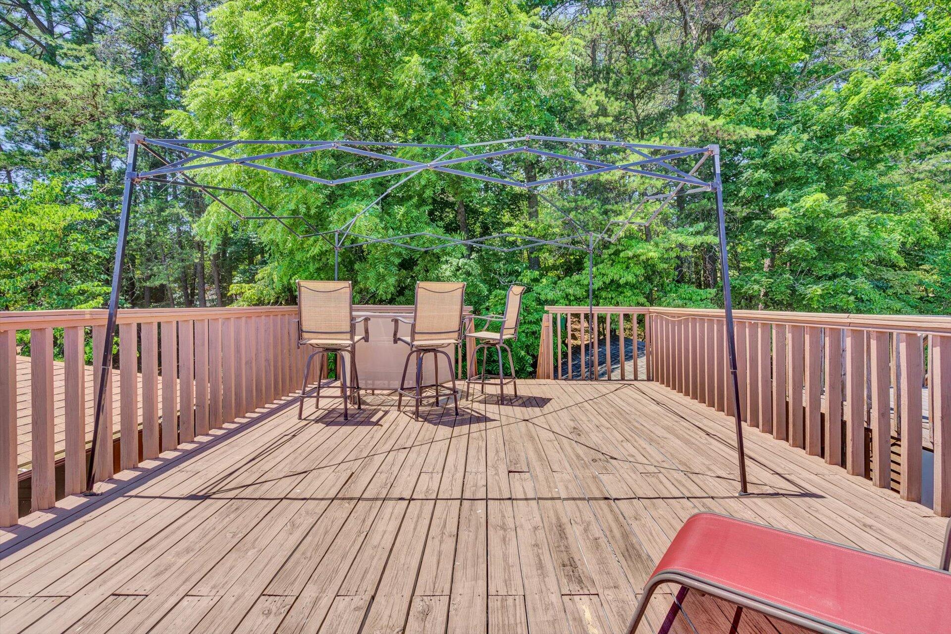 3499 Kemp Ford Road Union Hall, VA 24176 - Photo 45 of 52 a view of backyard with a deck and wooden floor