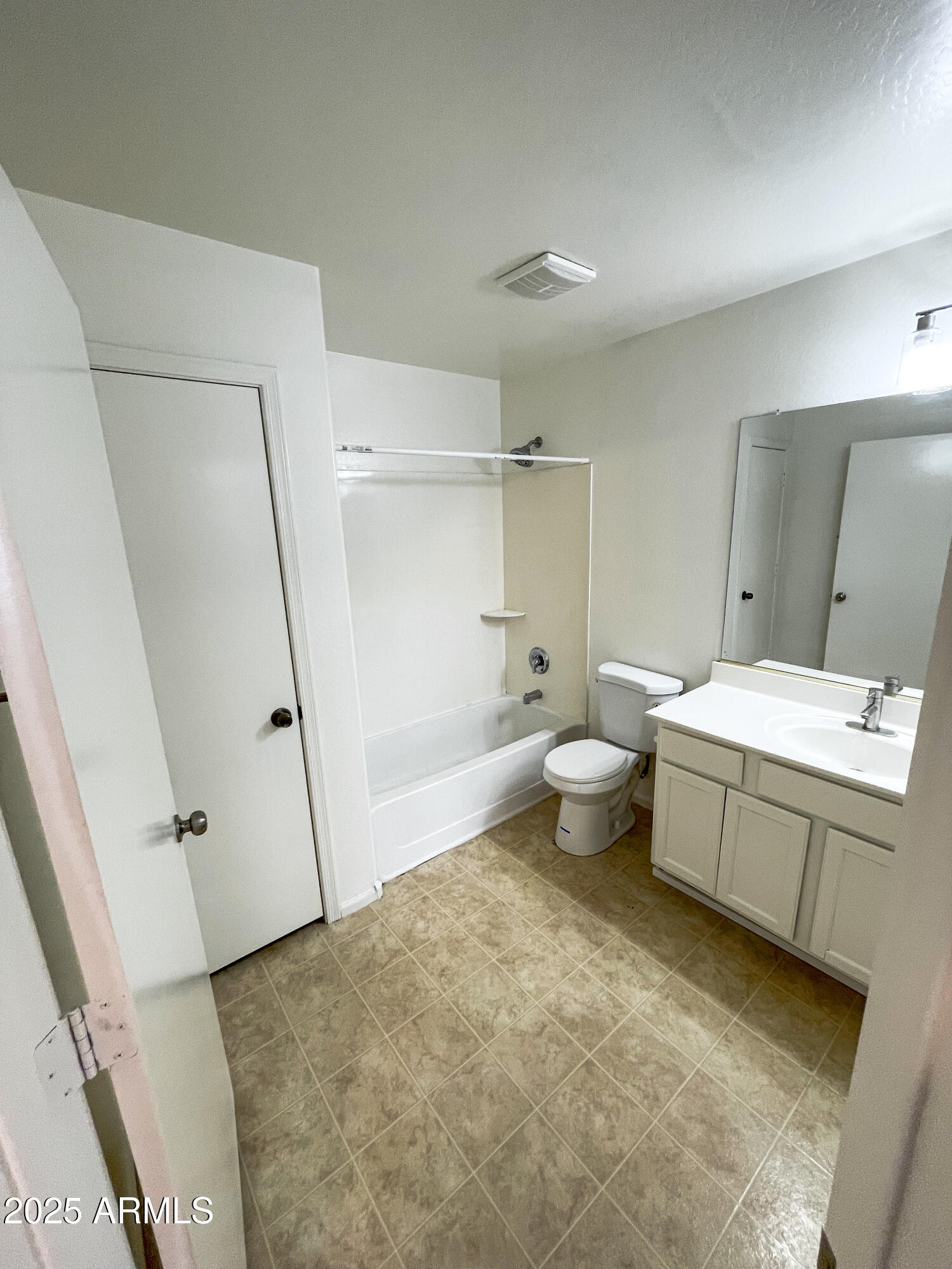 41389 Hopper Drive Maricopa, AZ 85138 - Photo 15 of 17 a bathroom with a sink a toilet and shower