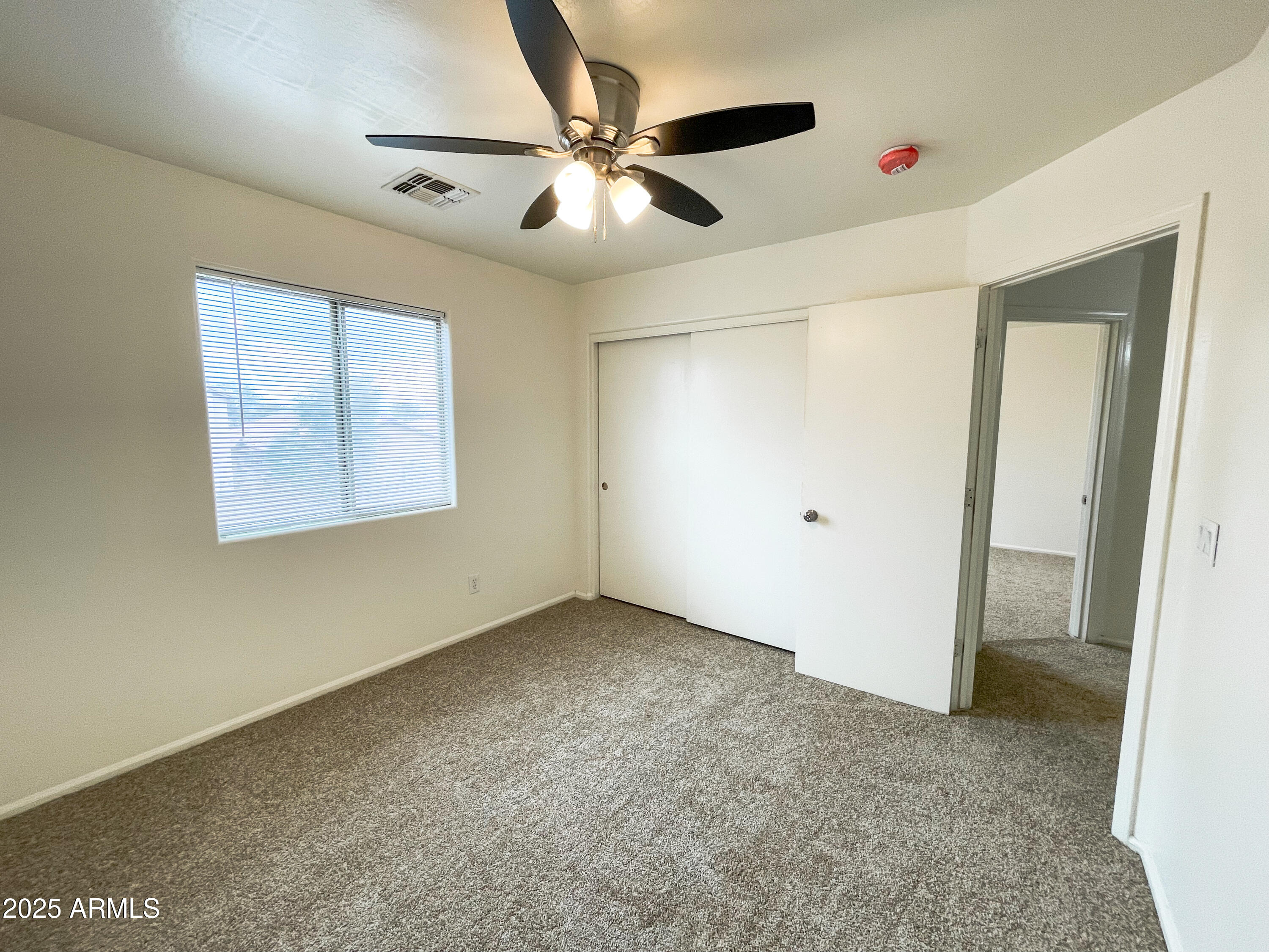 41389 Hopper Drive Maricopa, AZ 85138 - Photo 9 of 17 a view of an empty room