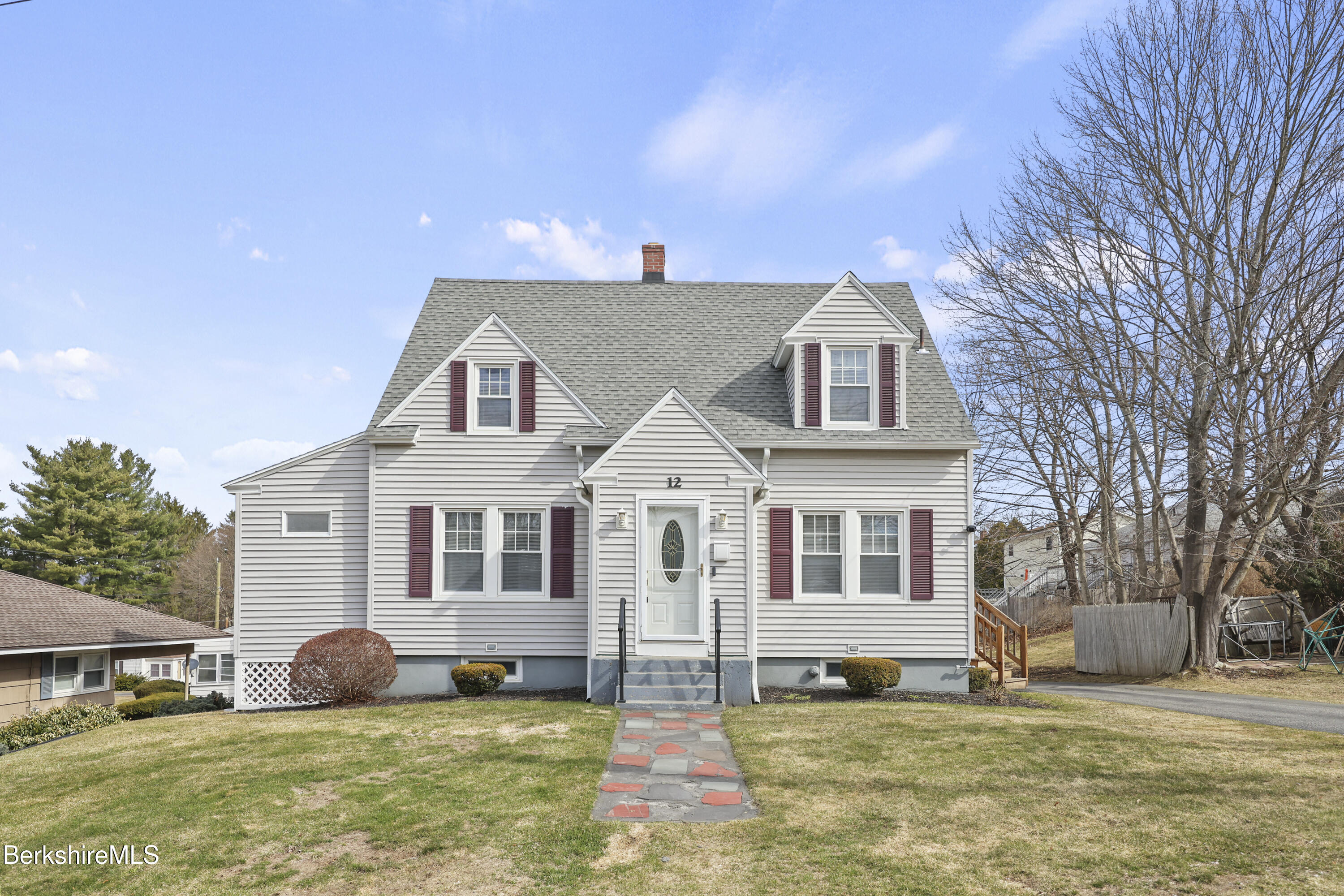 12 Sherrill Avenue Pittsfield, MA 01201 - Photo 1 of 40 a front view of a house with a yard