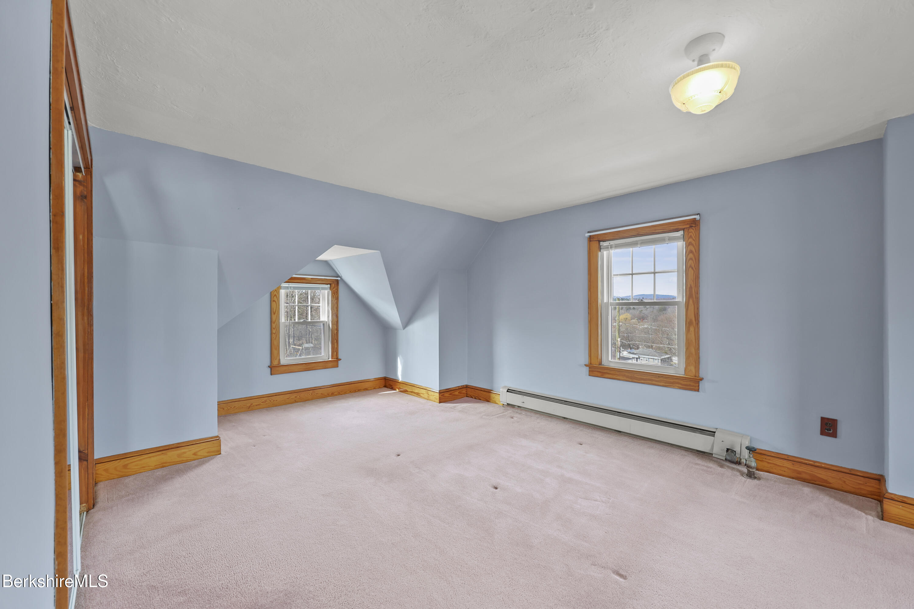 12 Sherrill Avenue Pittsfield, MA 01201 - Photo 19 of 40 a view of a room with window and wooden floor
