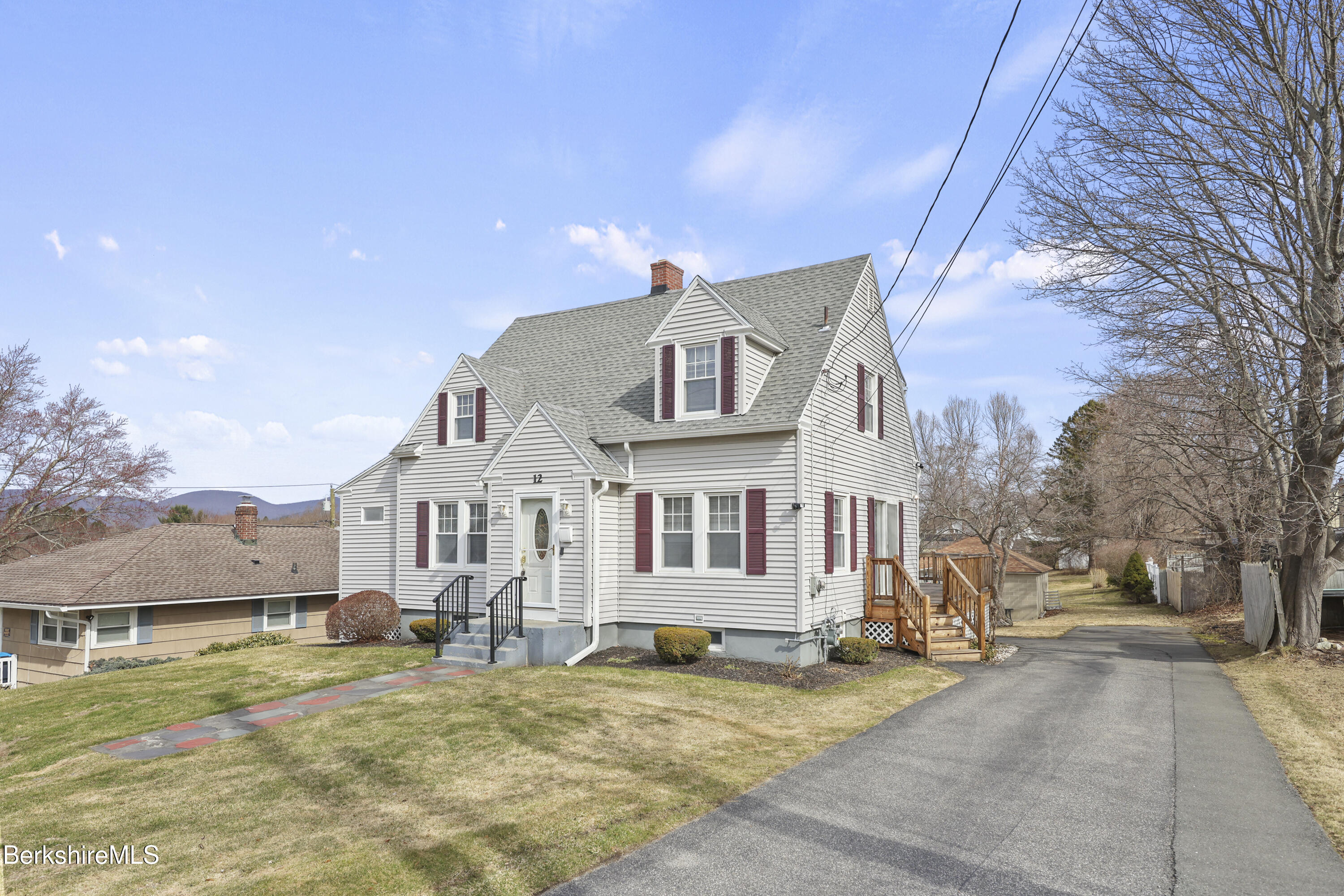 12 Sherrill Avenue Pittsfield, MA 01201 - Photo 2 of 40 a front view of a house with a yard