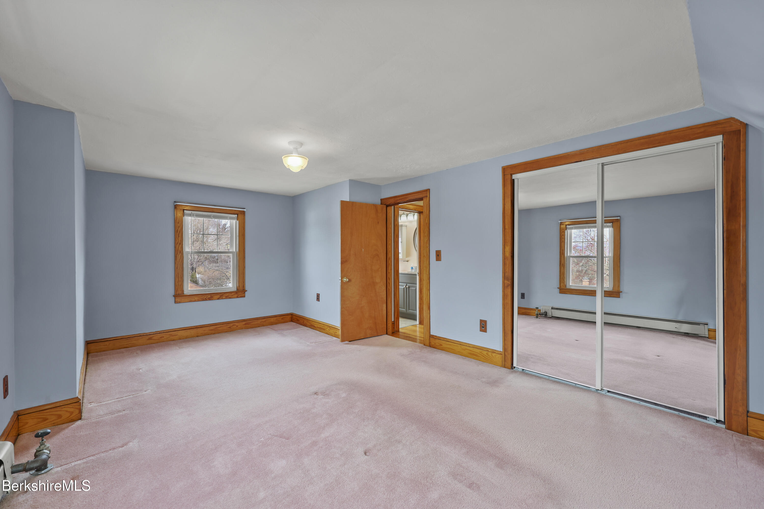 12 Sherrill Avenue Pittsfield, MA 01201 - Photo 22 of 40 an empty room with windows and closet