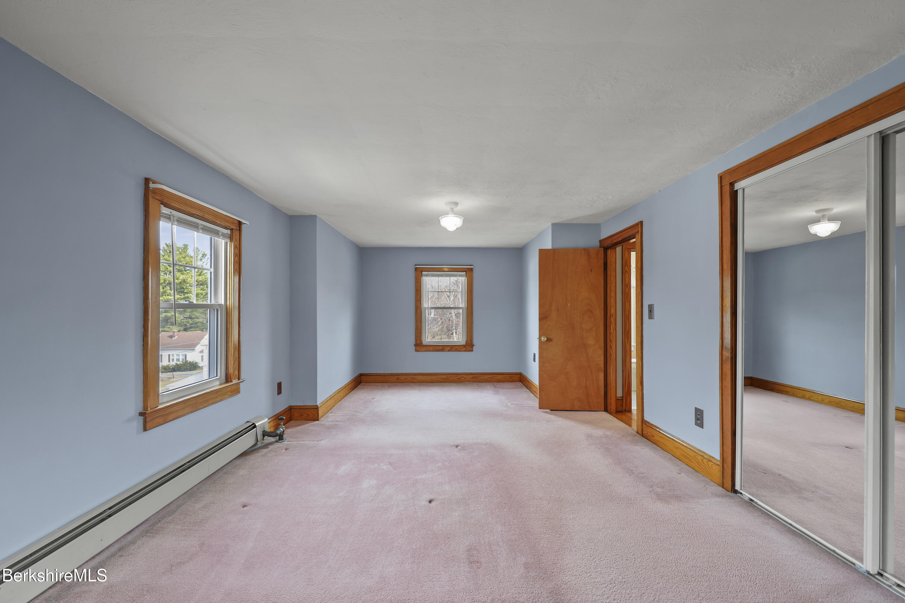 12 Sherrill Avenue Pittsfield, MA 01201 - Photo 23 of 40 an empty room with windows and closet
