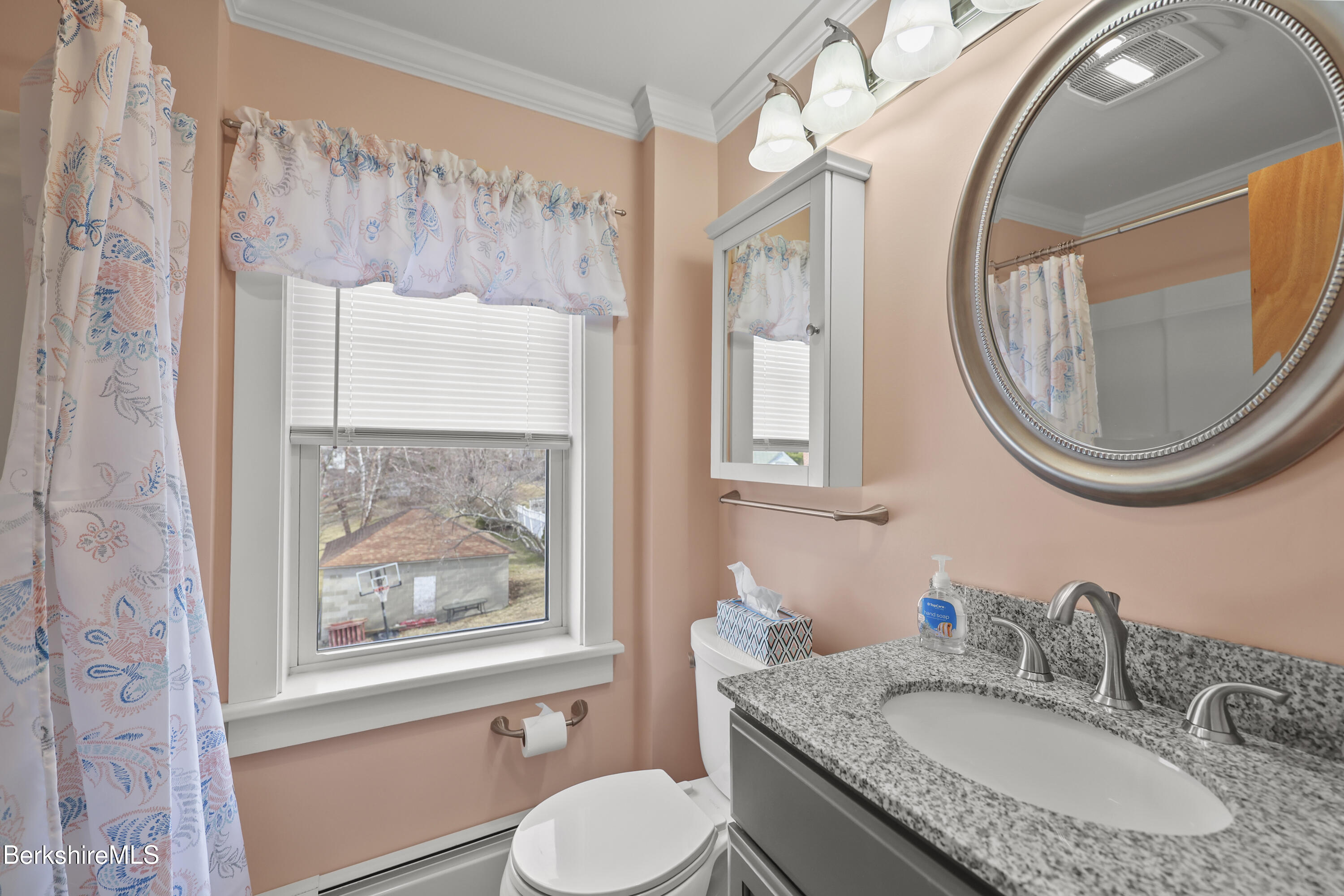 12 Sherrill Avenue Pittsfield, MA 01201 - Photo 28 of 40 a bathroom with a granite countertop toilet sink and mirror