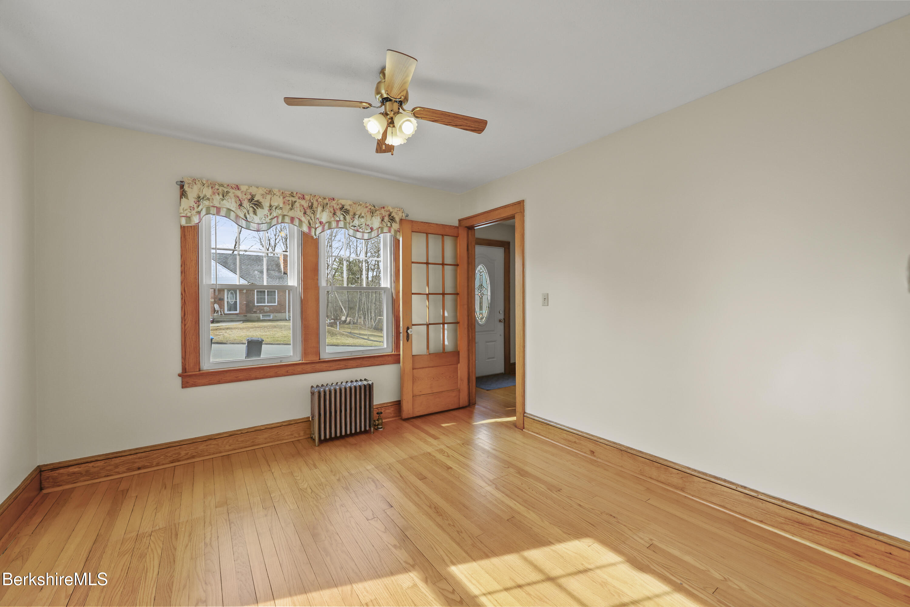 12 Sherrill Avenue Pittsfield, MA 01201 - Photo 4 of 40 a view of an empty room with a window