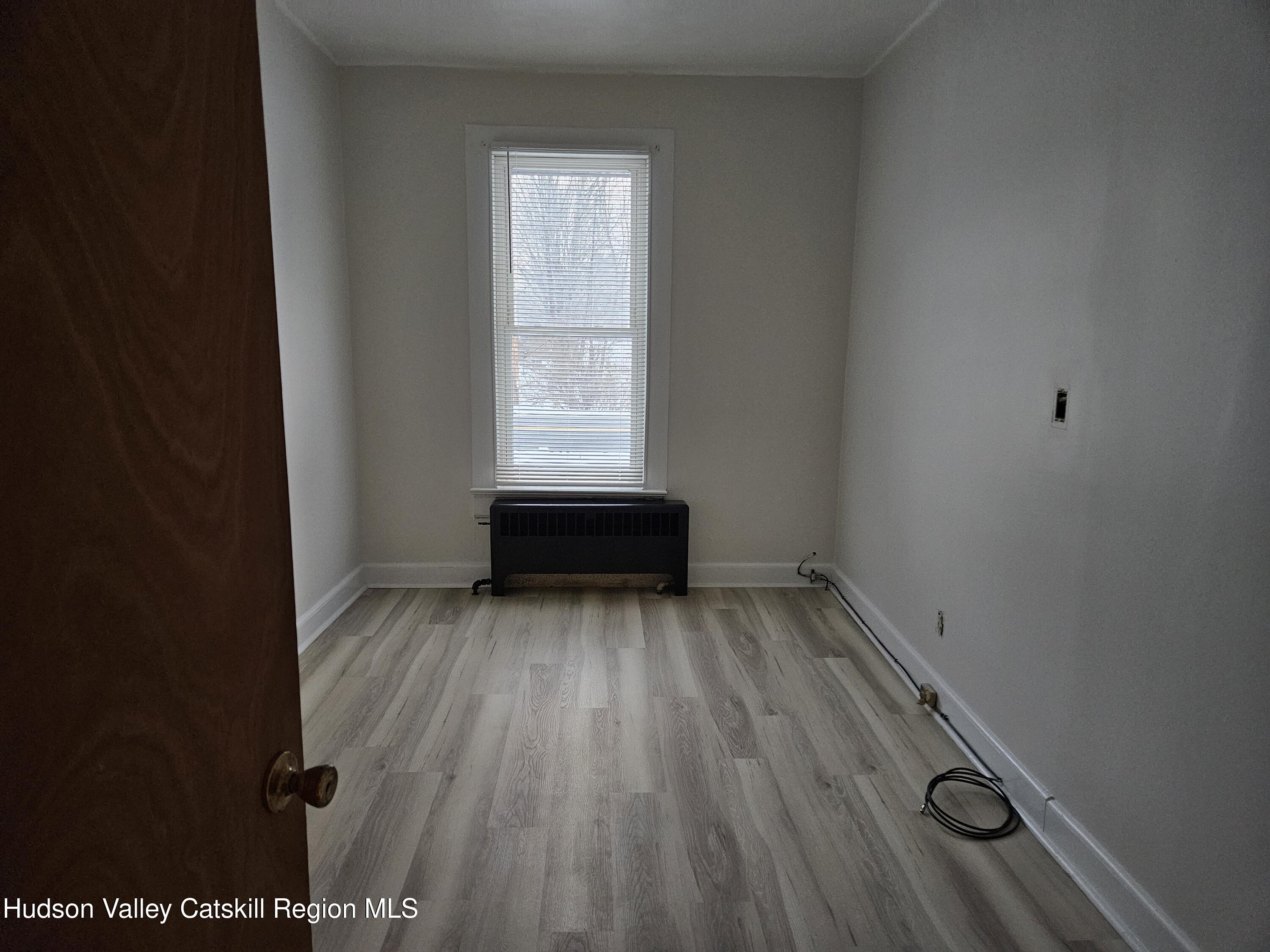 3624 County Rt 67 Freehold, NY 12431 - Photo 6 of 8 a view of a room with wooden floor and window