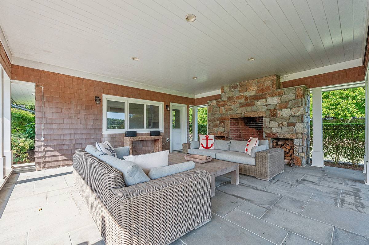 63 Newlight Lane Bridgehampton, NY 11976 - Photo 28 of 37 a living room with furniture and a fireplace