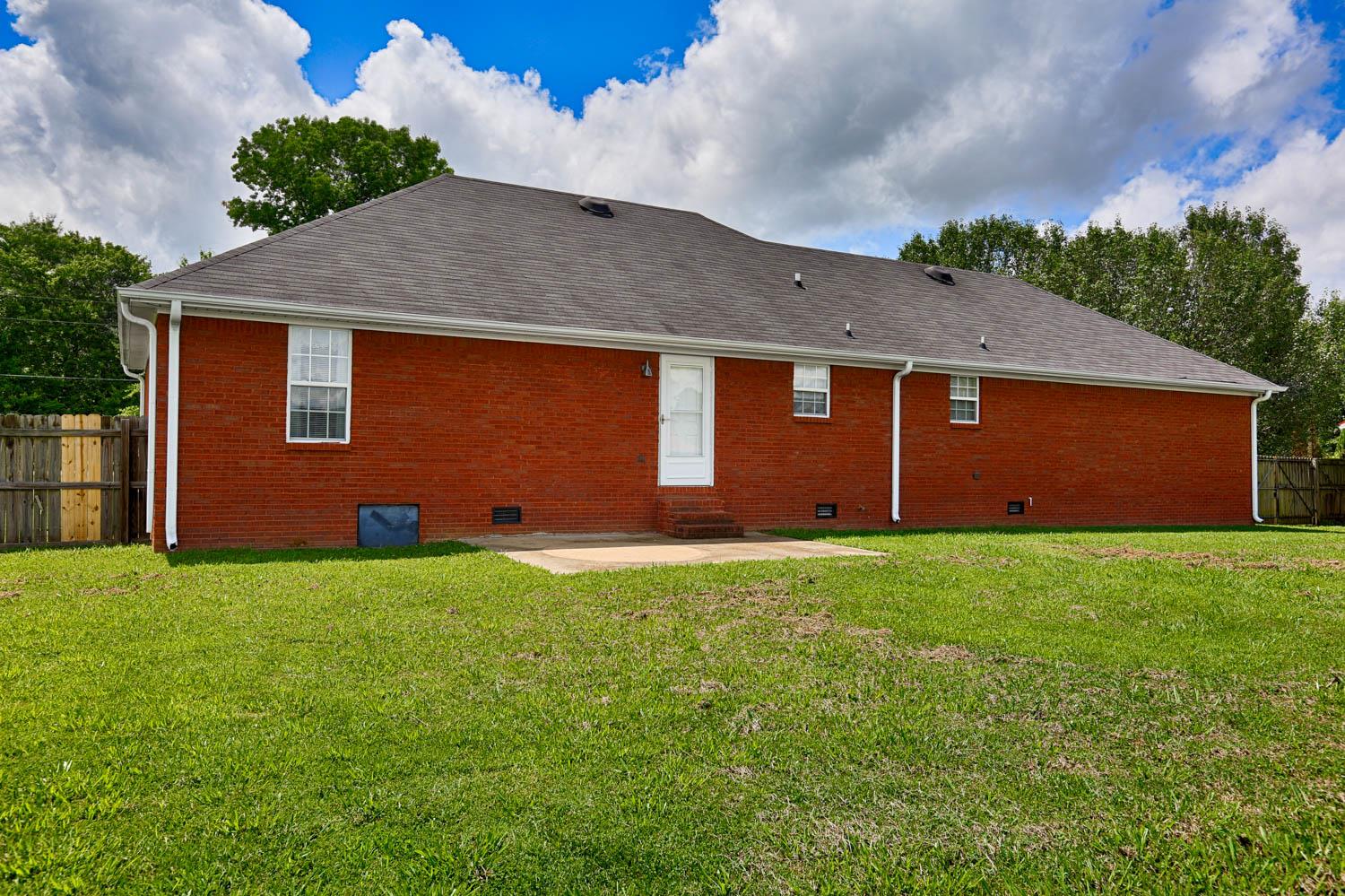 25156 Sand Springs Road Athens, AL 35613 - Photo 20 of 24 Back View of Home - Showing the back patio area.
