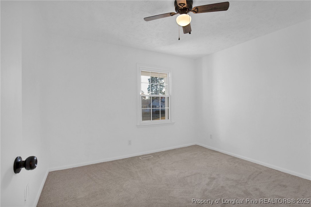 6806 Beaver Stone Road Fayetteville, NC 28314 - Photo 24 of 42 an empty room with a window