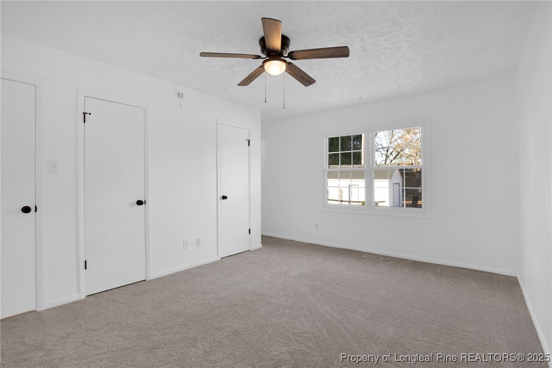 6806 Beaver Stone Road Fayetteville, NC 28314 - Photo 29 of 42 a view of an empty room with a window