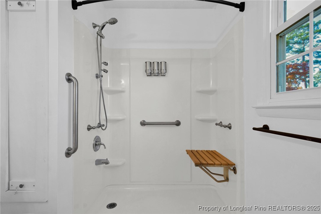 6806 Beaver Stone Road Fayetteville, NC 28314 - Photo 32 of 42 a bathroom with a shower