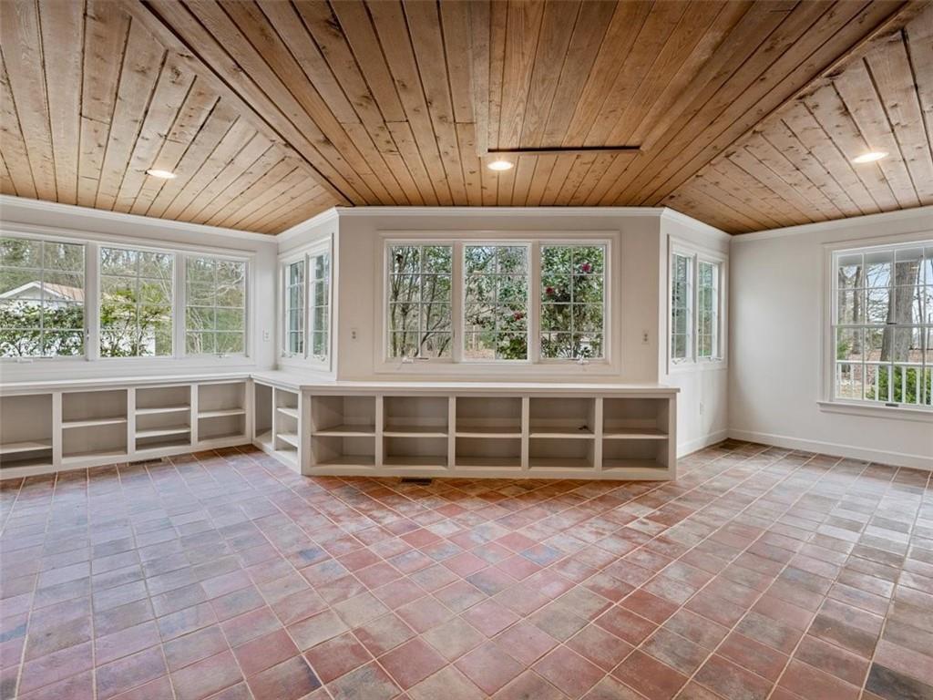 12831 Sturgeon Point Road Charles City, VA 23030 - Photo 13 of 31 A window-lined home office brings the country into your work space