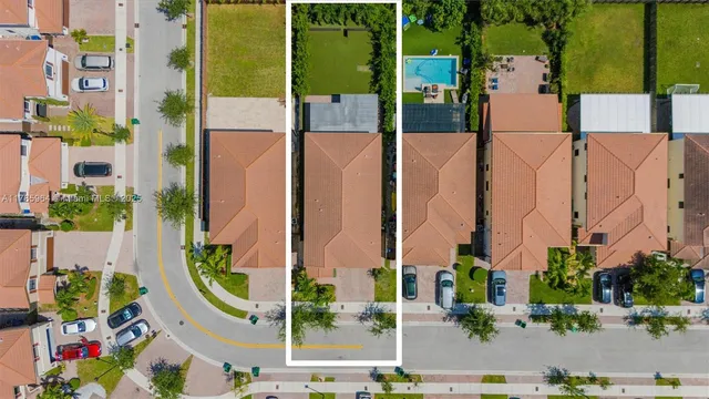 an aerial view of a city with tall buildings