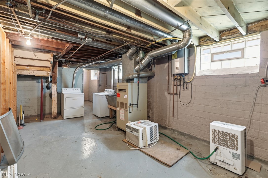 3511 Northcliffe Road Cleveland, OH 44118 - Photo 36 of 46 Utility area with exposed ceiling joists and ductwork, painted concrete block walls, and a visible water heater