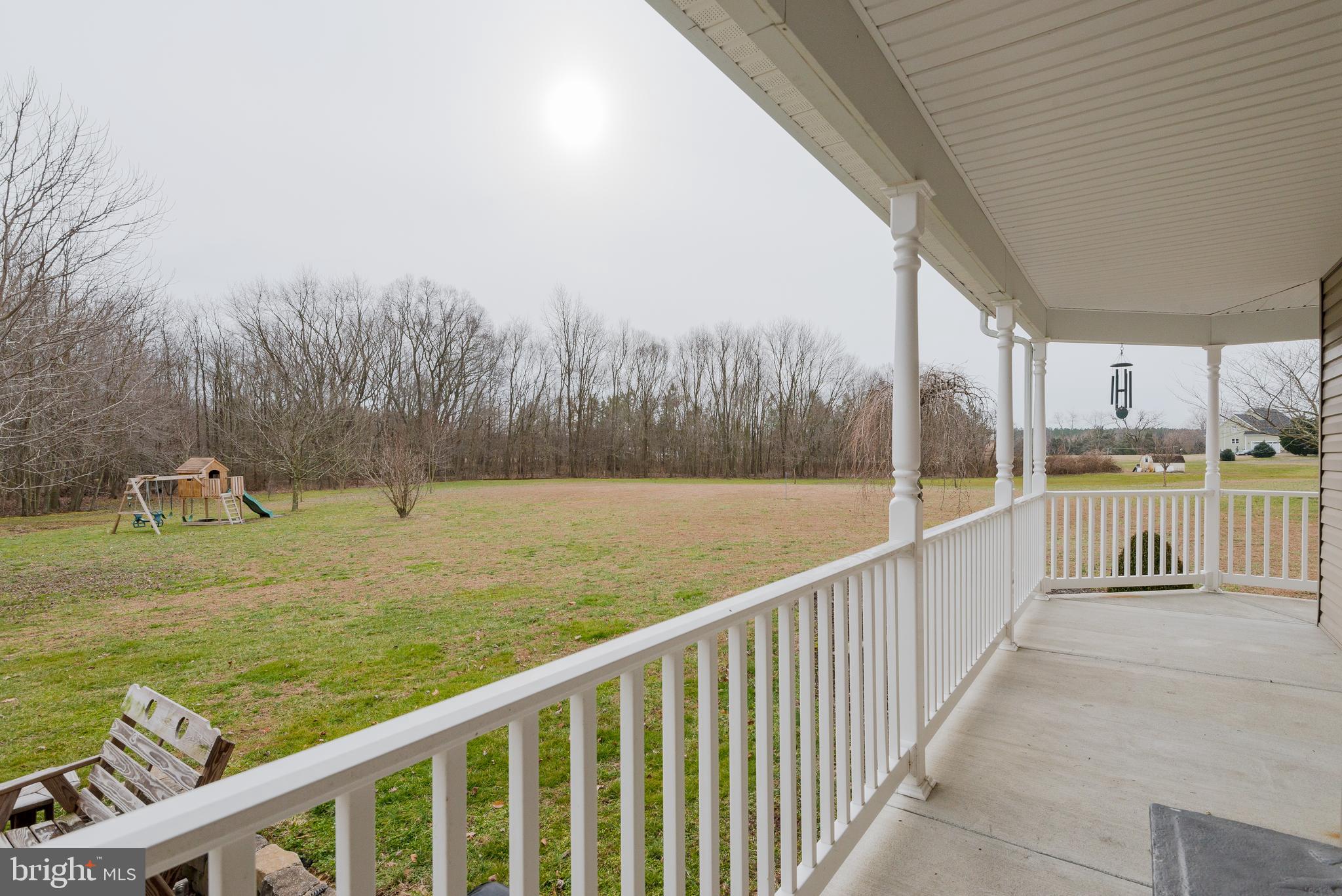 822 Duhamel Corner Road Marydel, MD 21649 - Photo 7 of 63 Lovely wrap around porch