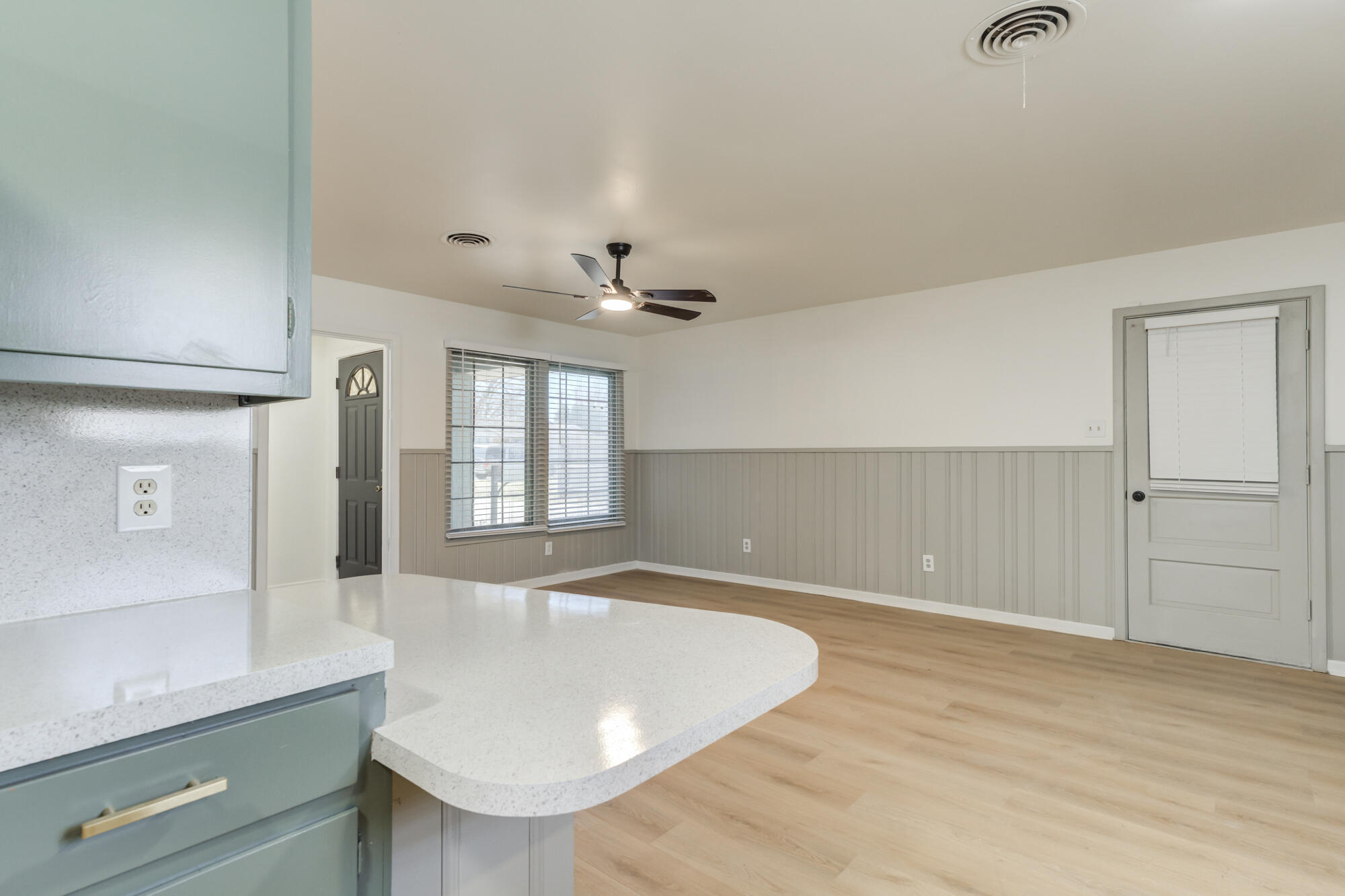 4404 28th Street Lubbock, TX 79410 - Photo 15 of 39 a view of an empty room with window and cabinet