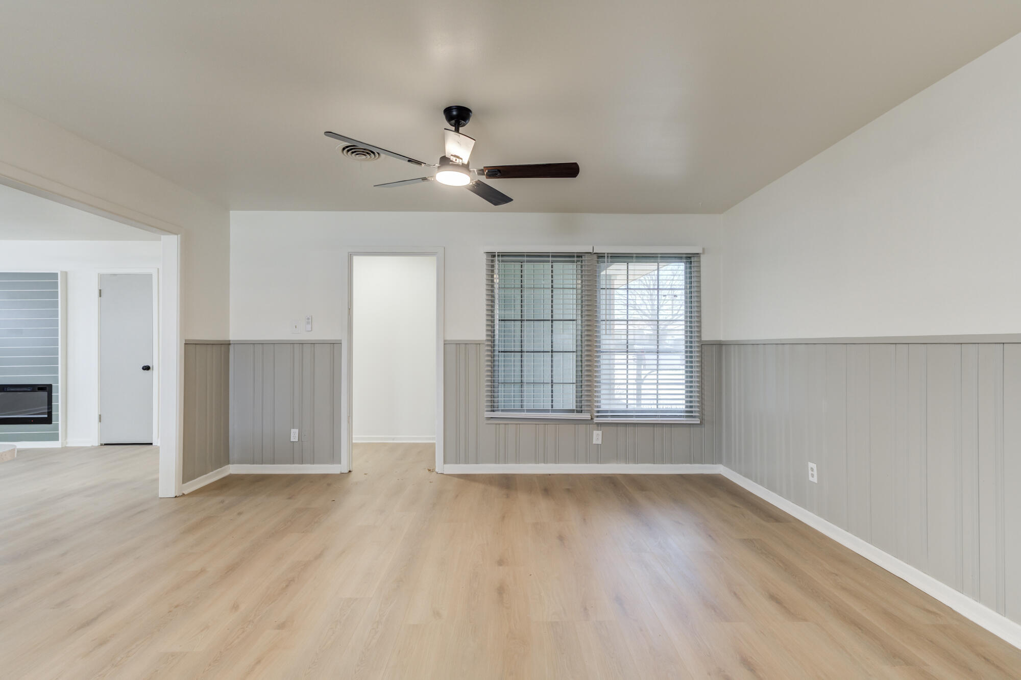 4404 28th Street Lubbock, TX 79410 - Photo 20 of 39 wooden floor in an empty room with a window