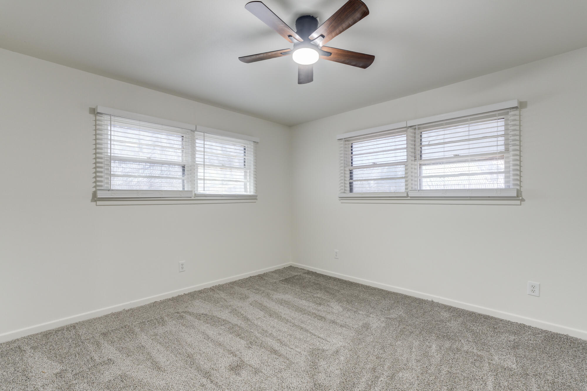 4404 28th Street Lubbock, TX 79410 - Photo 28 of 39 a view of empty room with windows