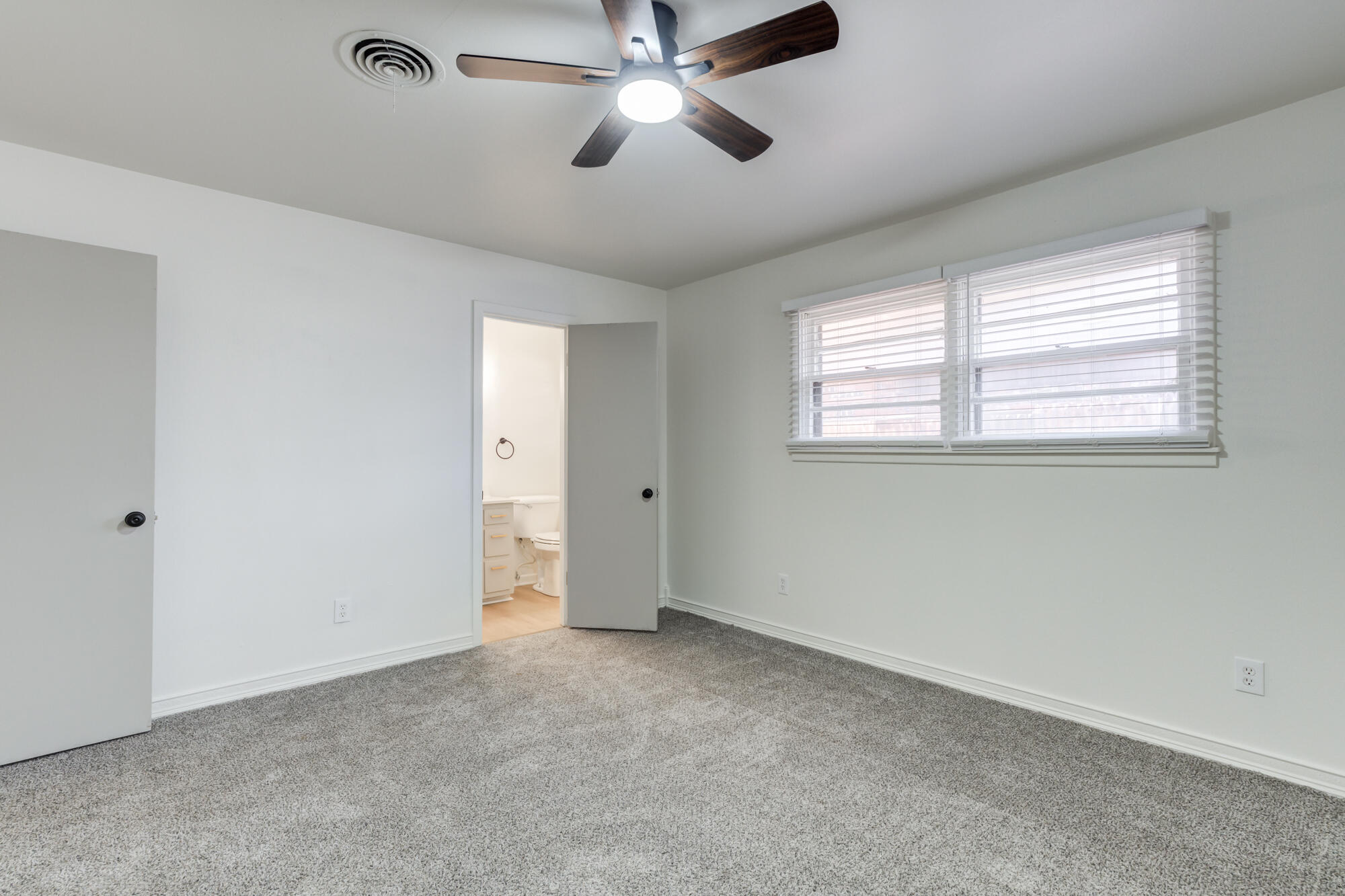 4404 28th Street Lubbock, TX 79410 - Photo 31 of 39 a view of an empty room with a window