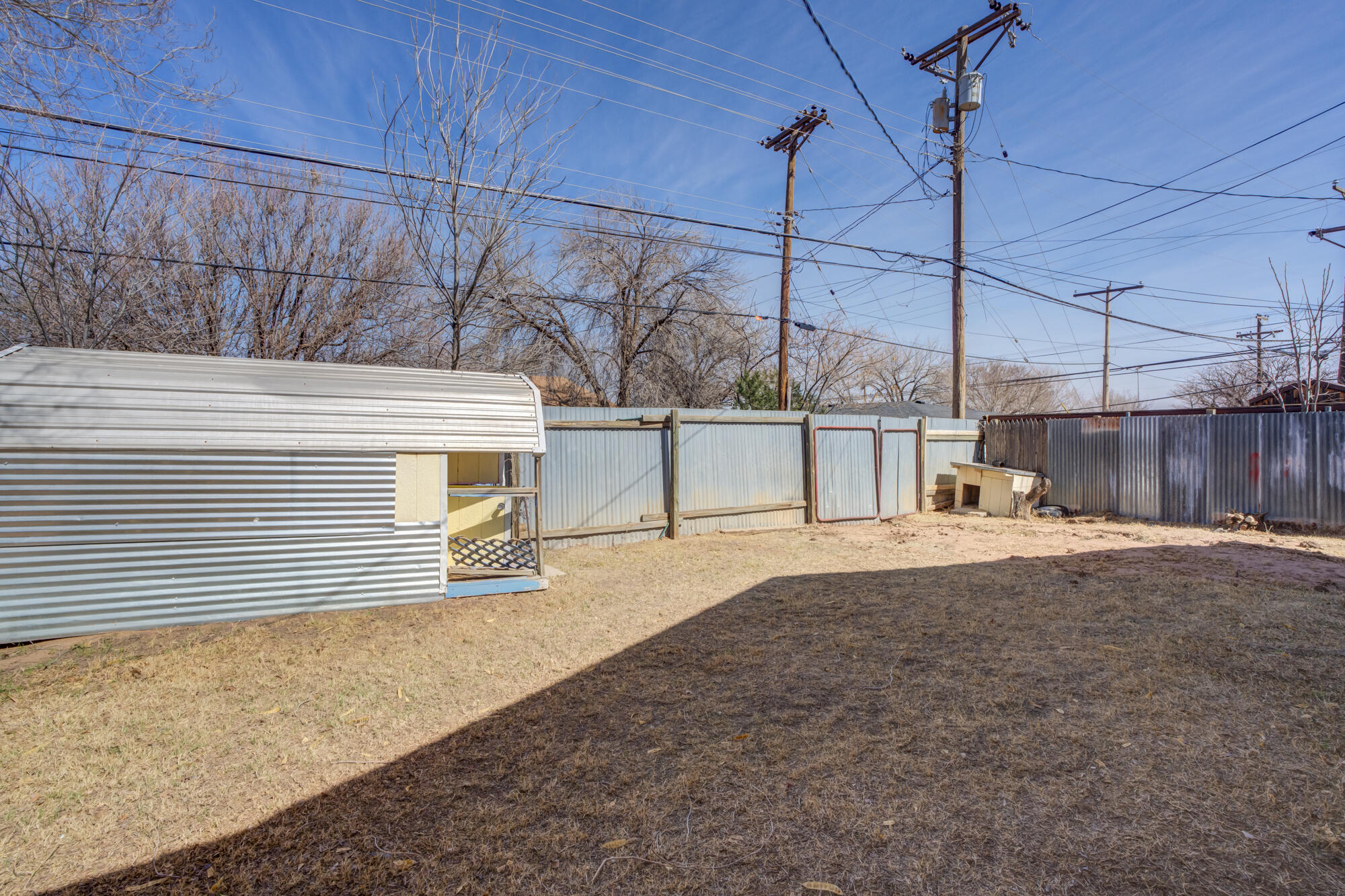 4404 28th Street Lubbock, TX 79410 - Photo 35 of 39 a view of a backyard of a house